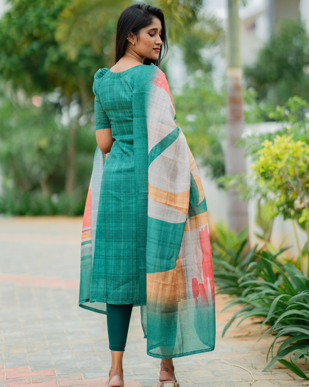 Shinu Wears Emerald Breeze Pure Crushed Organza Top & Kota Cotton Dupatta Set. A stylish, breathable ethnic wear in emerald green with an abstract printed dupatta, perfect for festive and casual occasions.