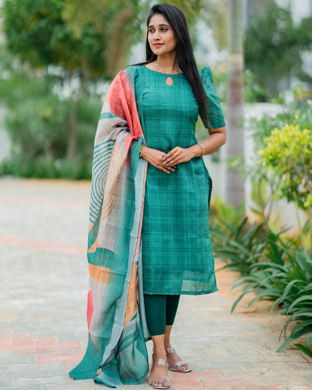 Shinu Wears Emerald Breeze Pure Crushed Organza Top & Kota Cotton Dupatta Set. A stylish, breathable ethnic wear in emerald green with an abstract printed dupatta, perfect for festive and casual occasions.