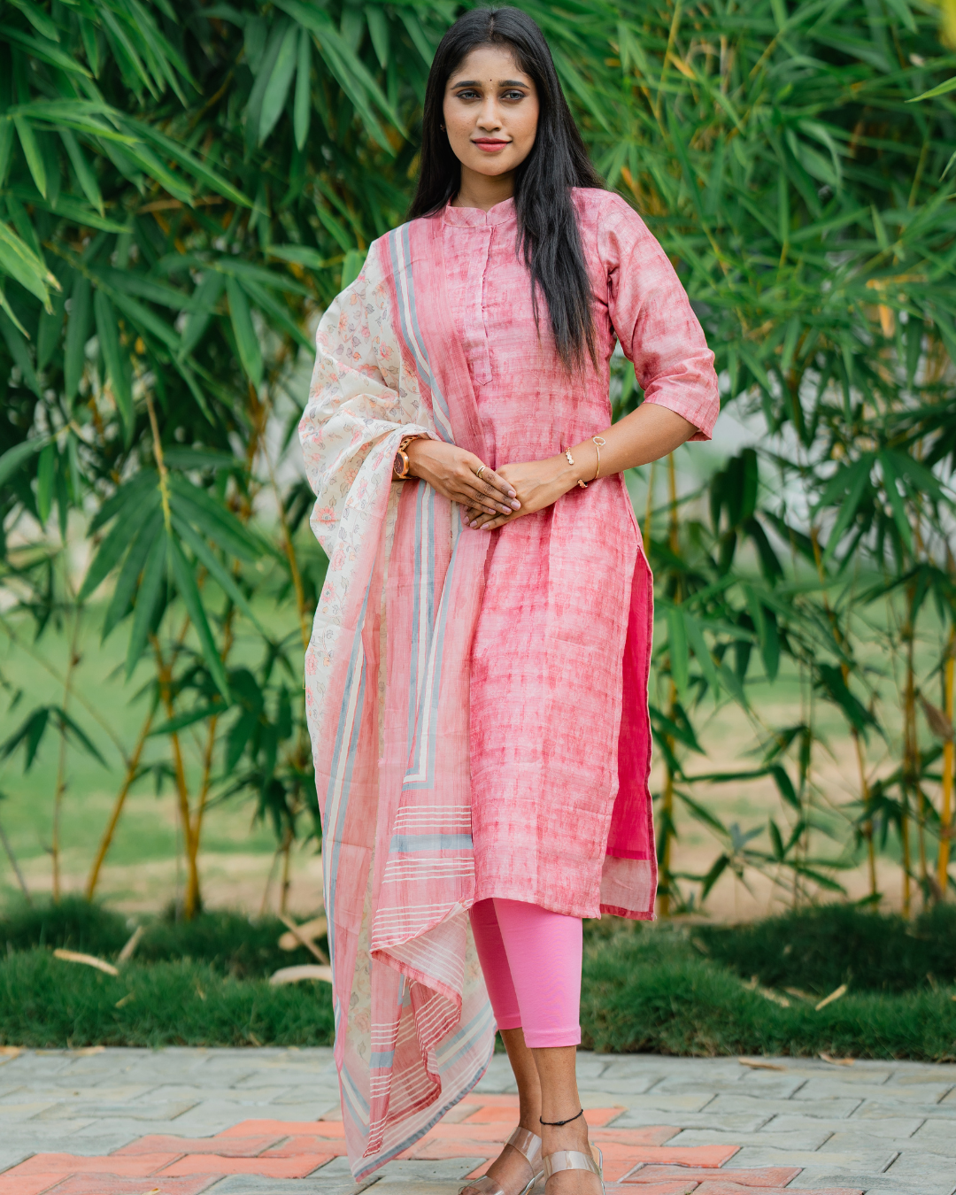 Shinu Wears Rosewood Blush Pure Crushed Organza Chudithar with a floral-embroidered dupatta. Lightweight, breathable, and perfect for festive and casual occasions.
