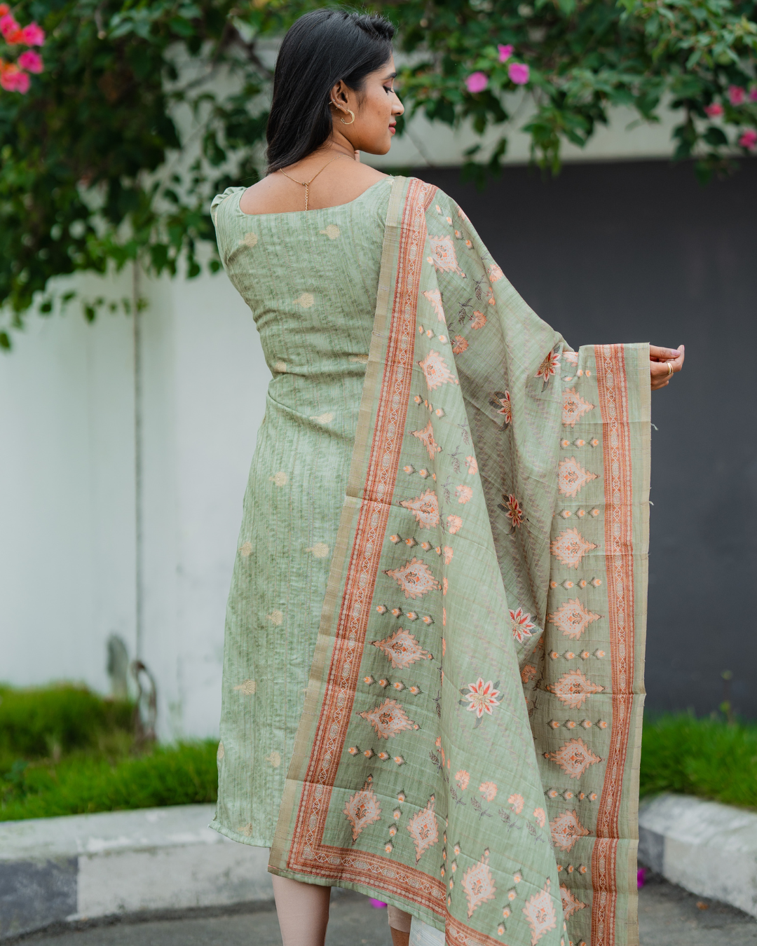 Shinu Wears Sage Blossom Pure Crushed Organza Top & Kota Cotton Dupatta Set in sage green with intricate embroidery. A stylish and lightweight ethnic wear for festive and casual occasions.
