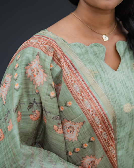 Shinu Wears Sage Blossom Pure Crushed Organza Top & Kota Cotton Dupatta Set in sage green with intricate embroidery. A stylish and lightweight ethnic wear for festive and casual occasions.