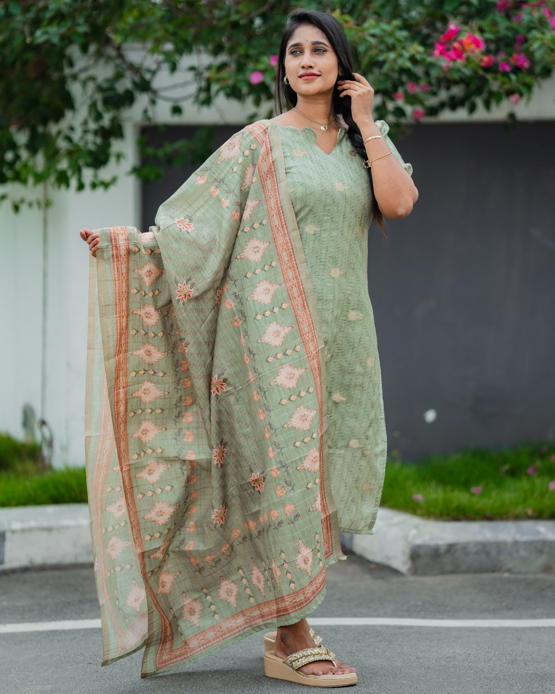 Shinu Wears Sage Blossom Pure Crushed Organza Top & Kota Cotton Dupatta Set in sage green with intricate embroidery. A stylish and lightweight ethnic wear for festive and casual occasions.